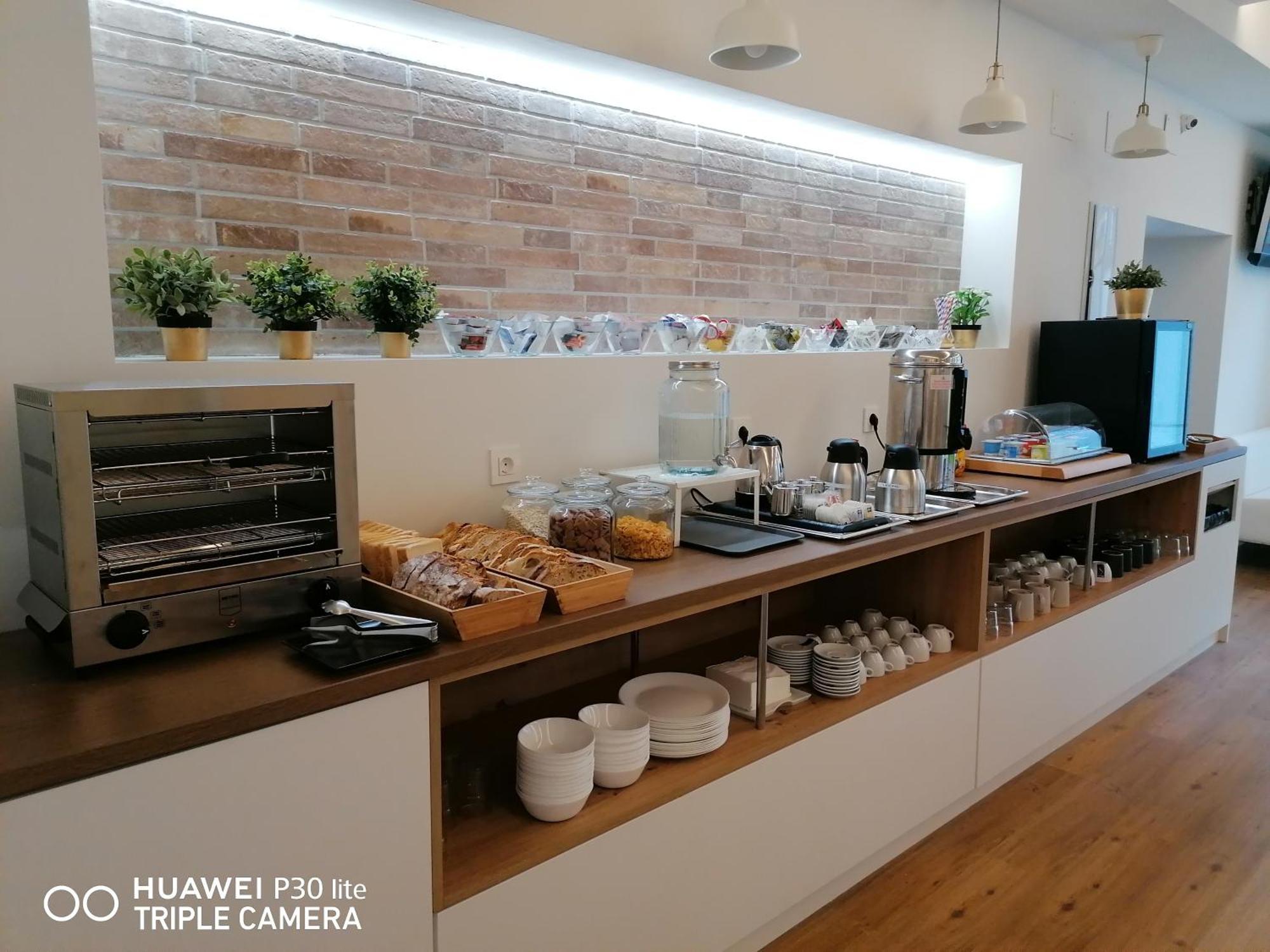 Apartamentos Turisticos Santa Apolonia 62 阿维莱斯 外观 照片